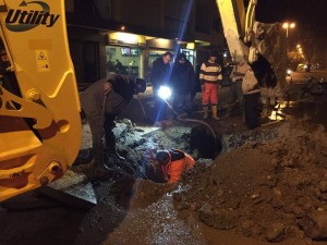 Working through the night to make the necessary repairs to the water supply system.